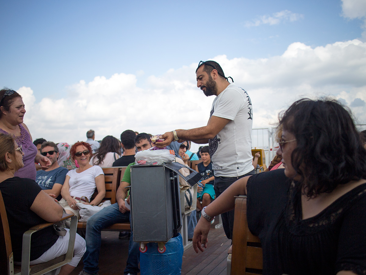 seller on a ferry in istanbul