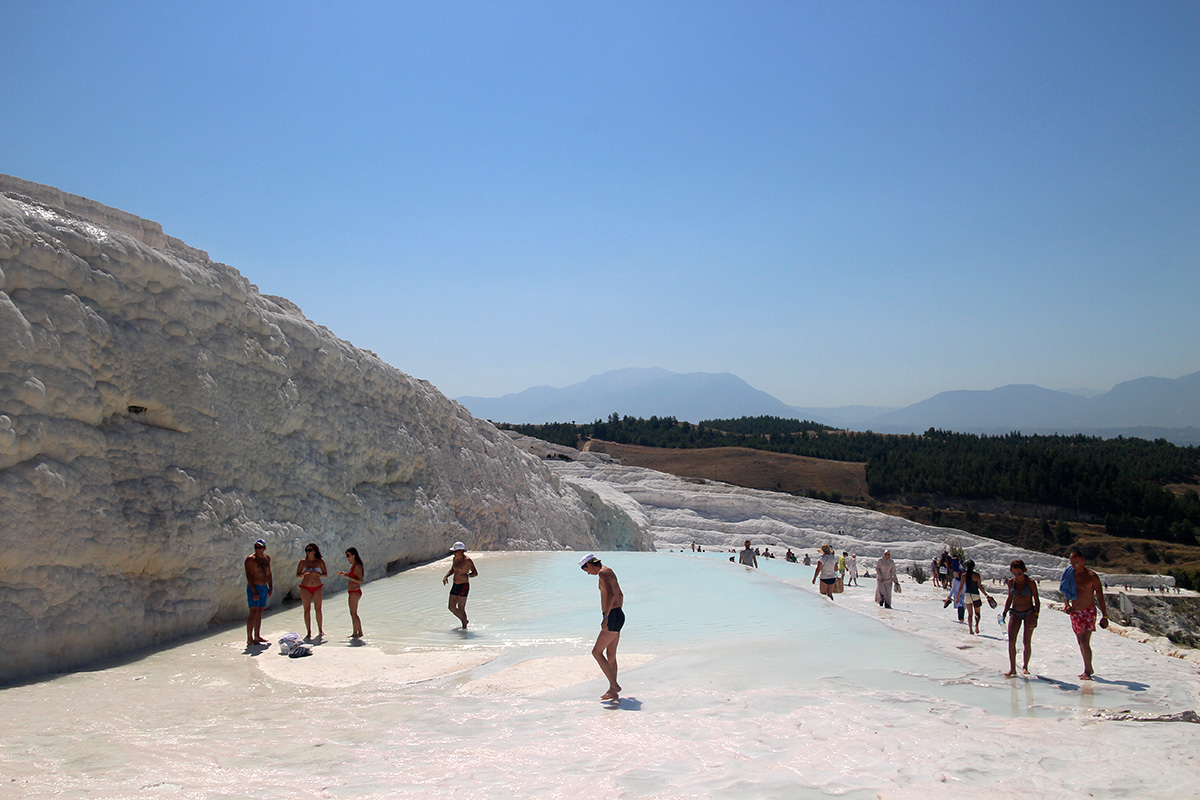 people bathing in pamukkale