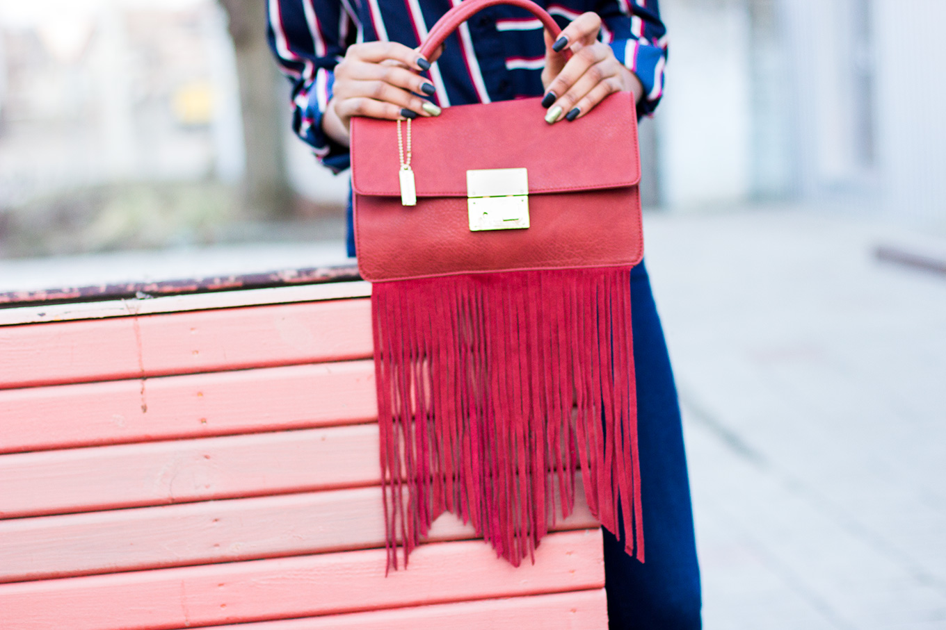 Grab on fringe handbag