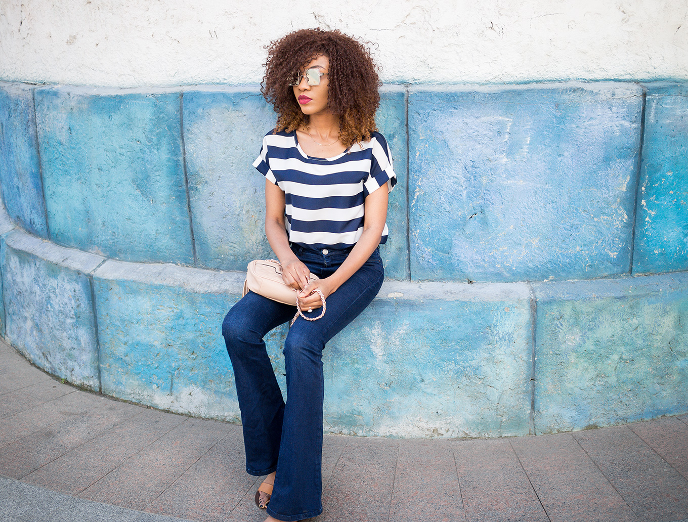 Bold stripes outfit with flare jeans