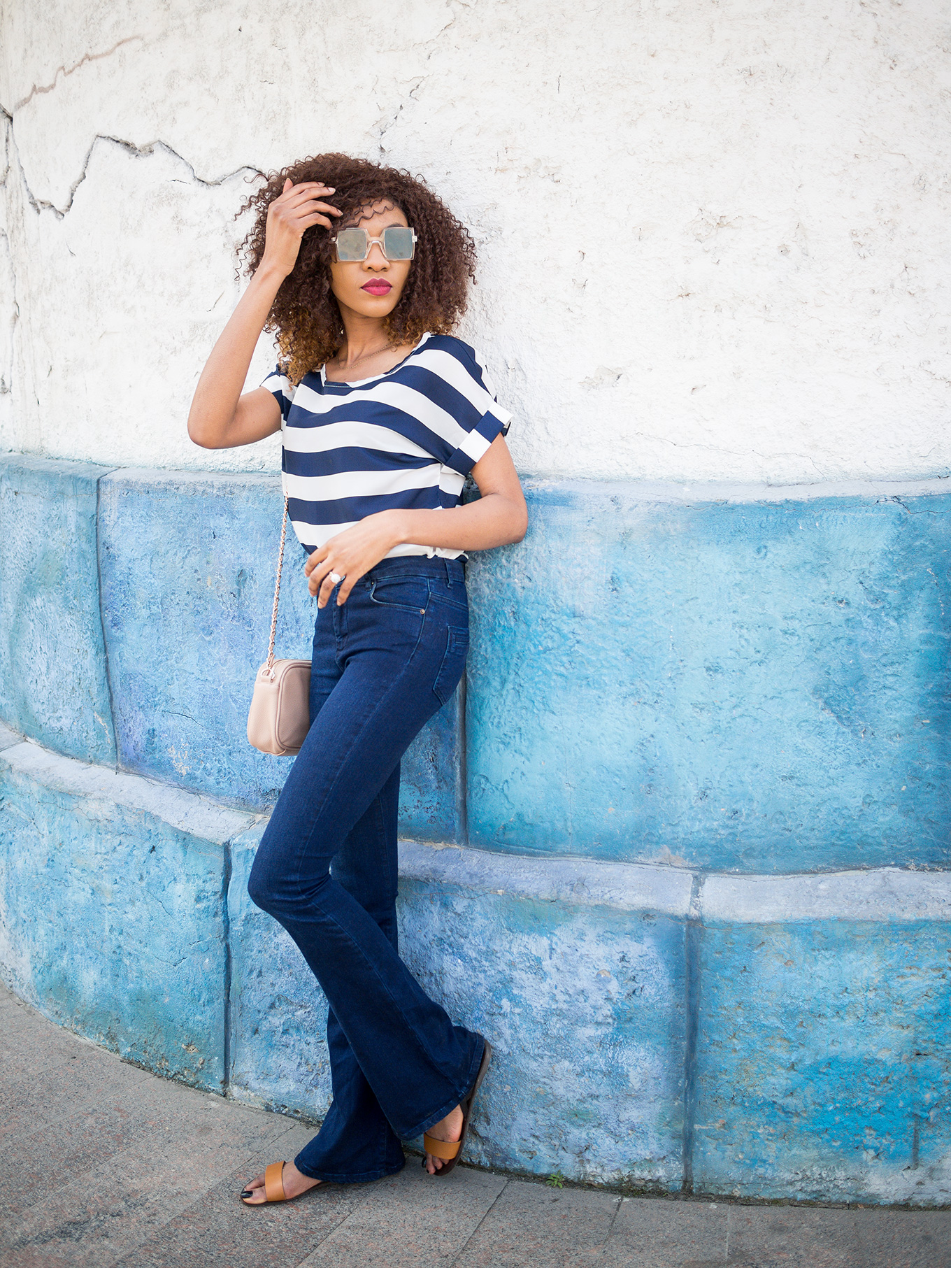 Bold striped top and jeans outfit