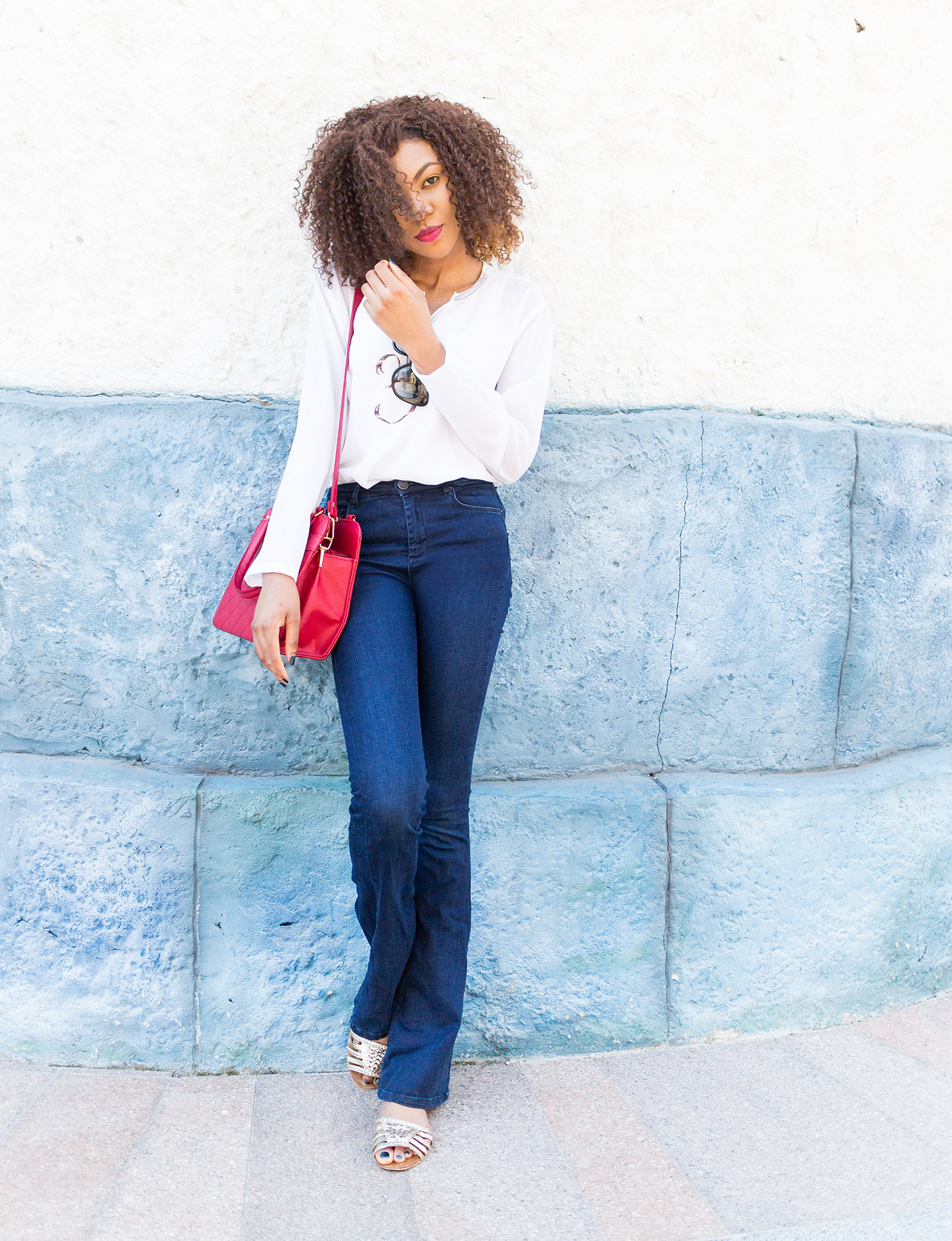 Embroidered neck blouse look on flare jeans