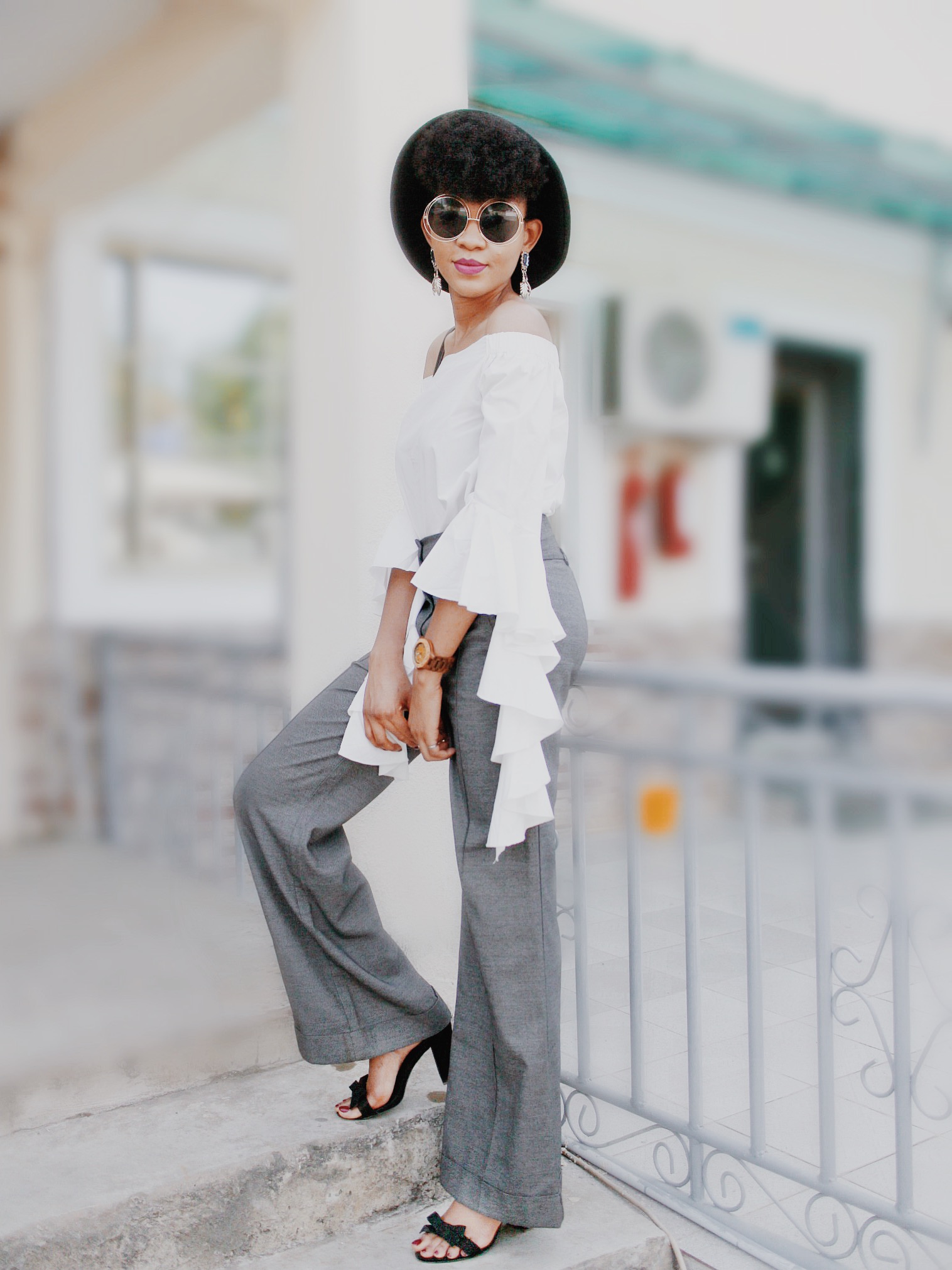 Nigerian fashion blogger in Abuja with Natural hair wearing Ruffles Flare Sleeve Off Shoulder top Outfit