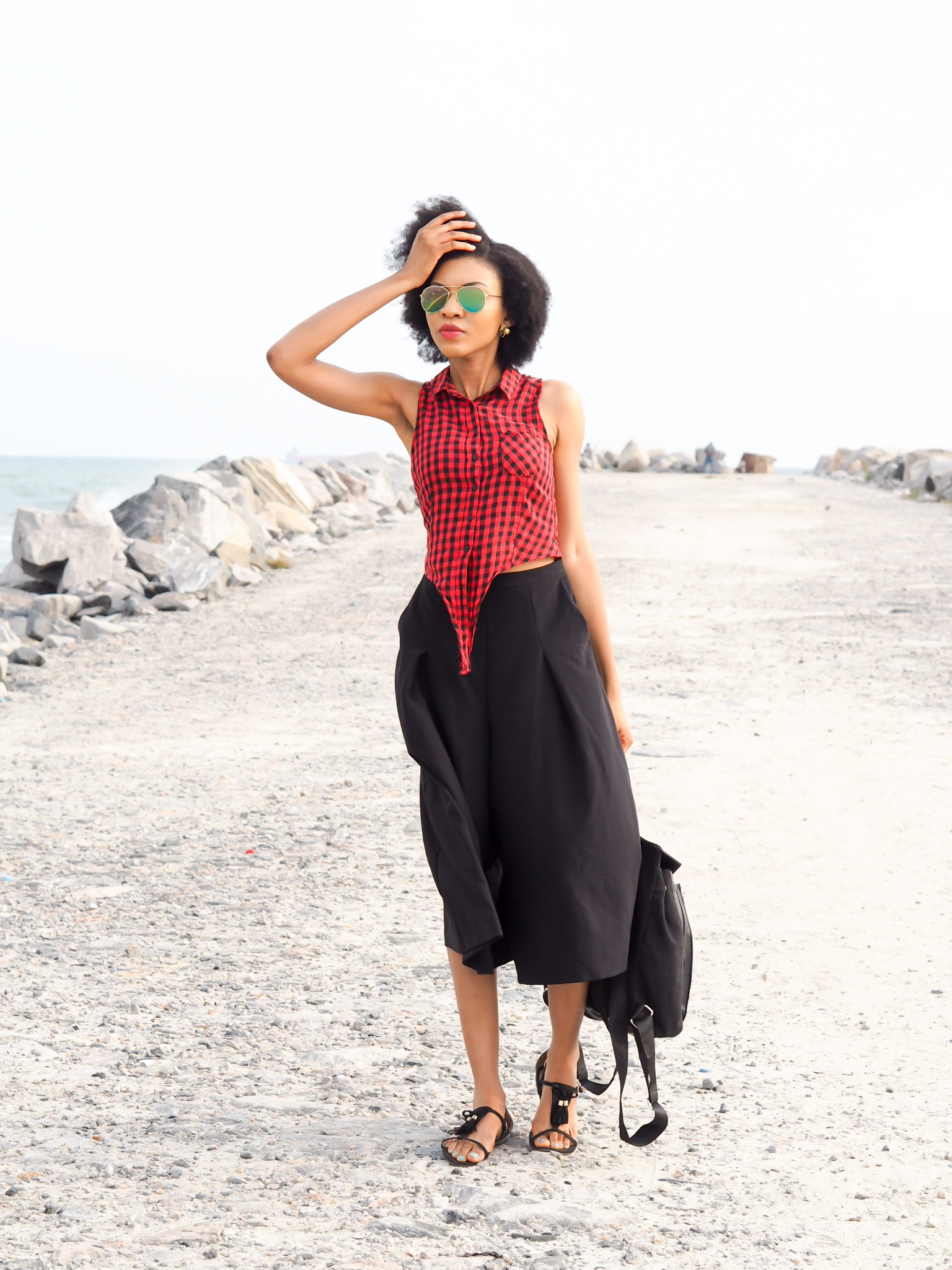 Nigerian style blogger Modavracha in red check shirt 