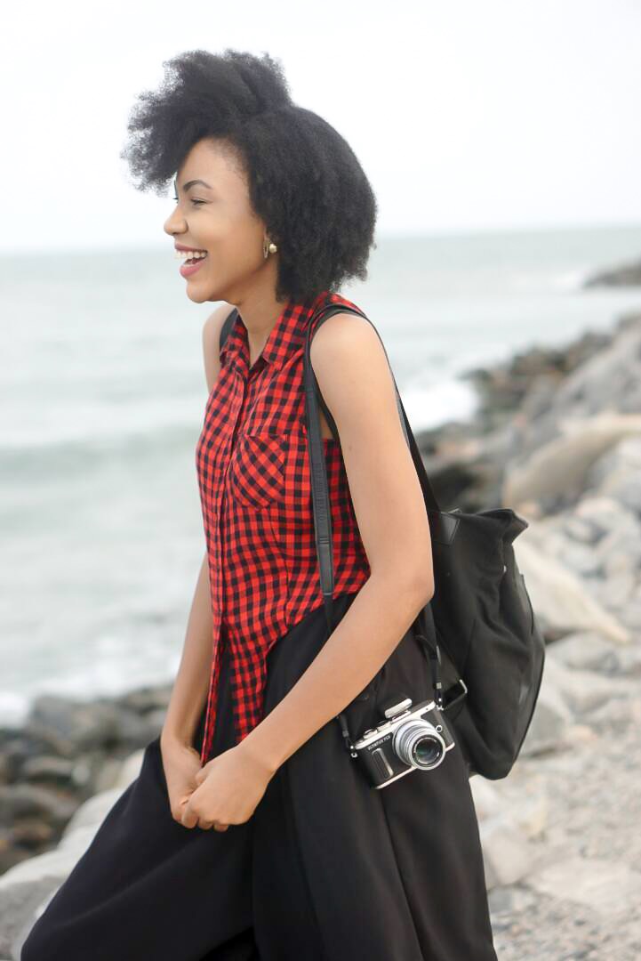 Nigerian blogger Modavracha with Olympus pen camera