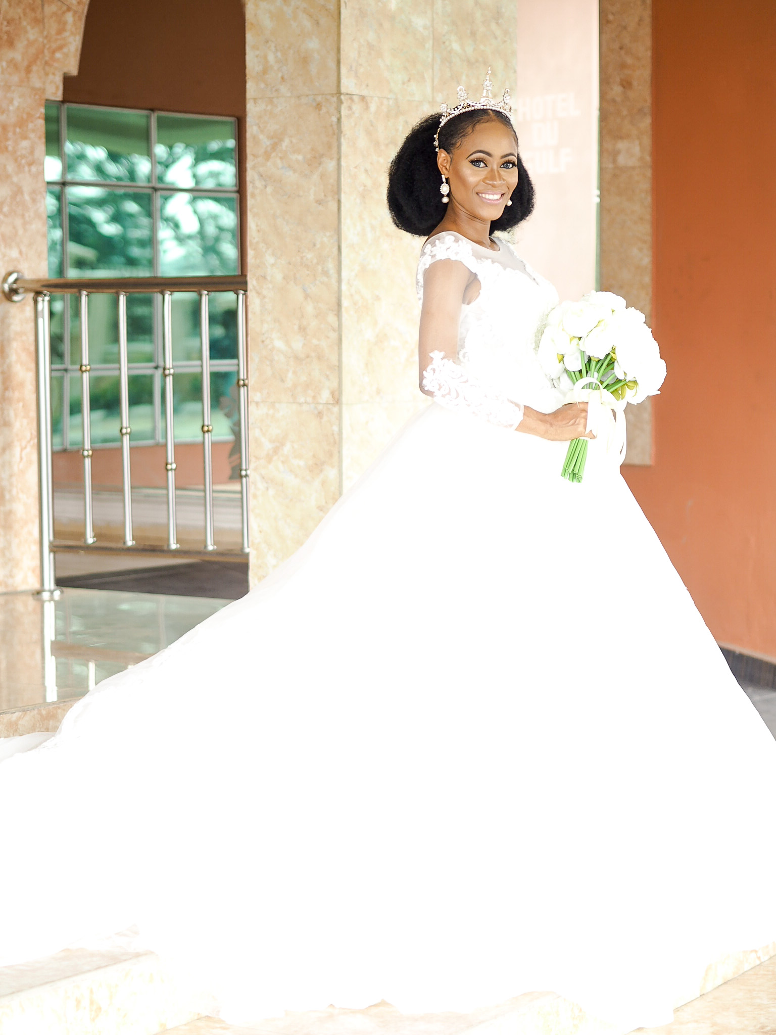 kinky ponytail bridal hair inspiration for Nigerian wedding 