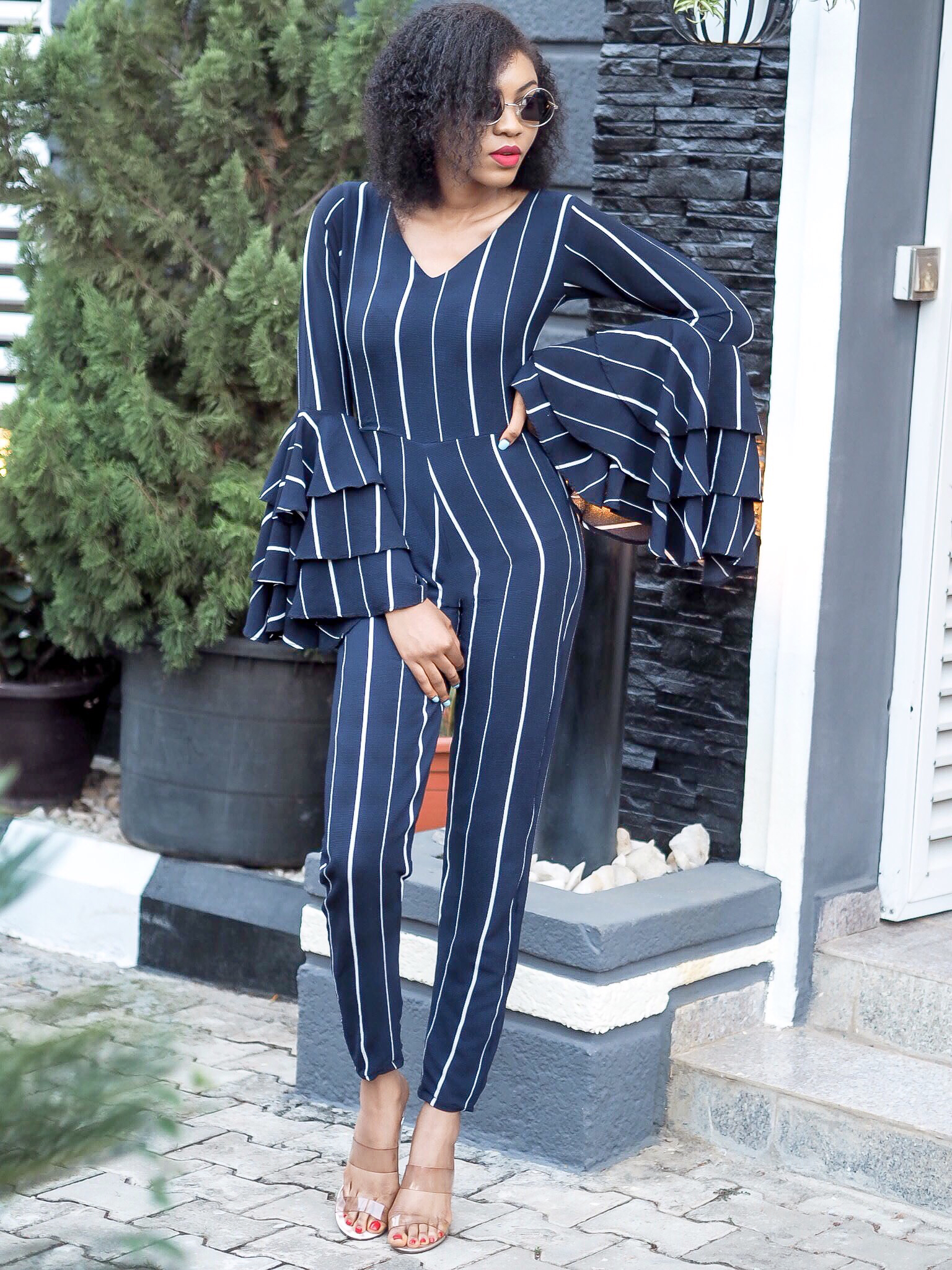 blue and white striped jumpsuit blogger outfit