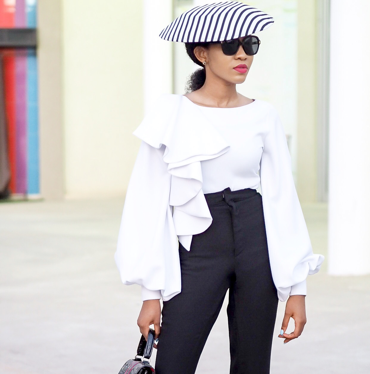 black and white monochrome outfit with saucer hat