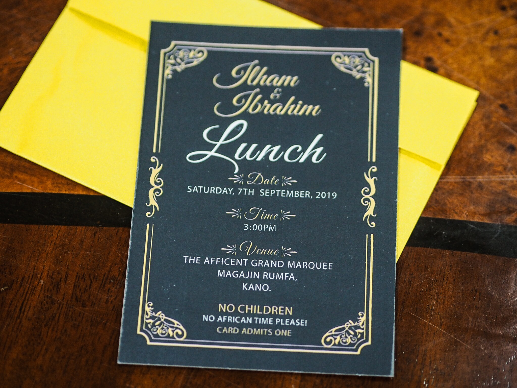 Black and gold wedding invitation card