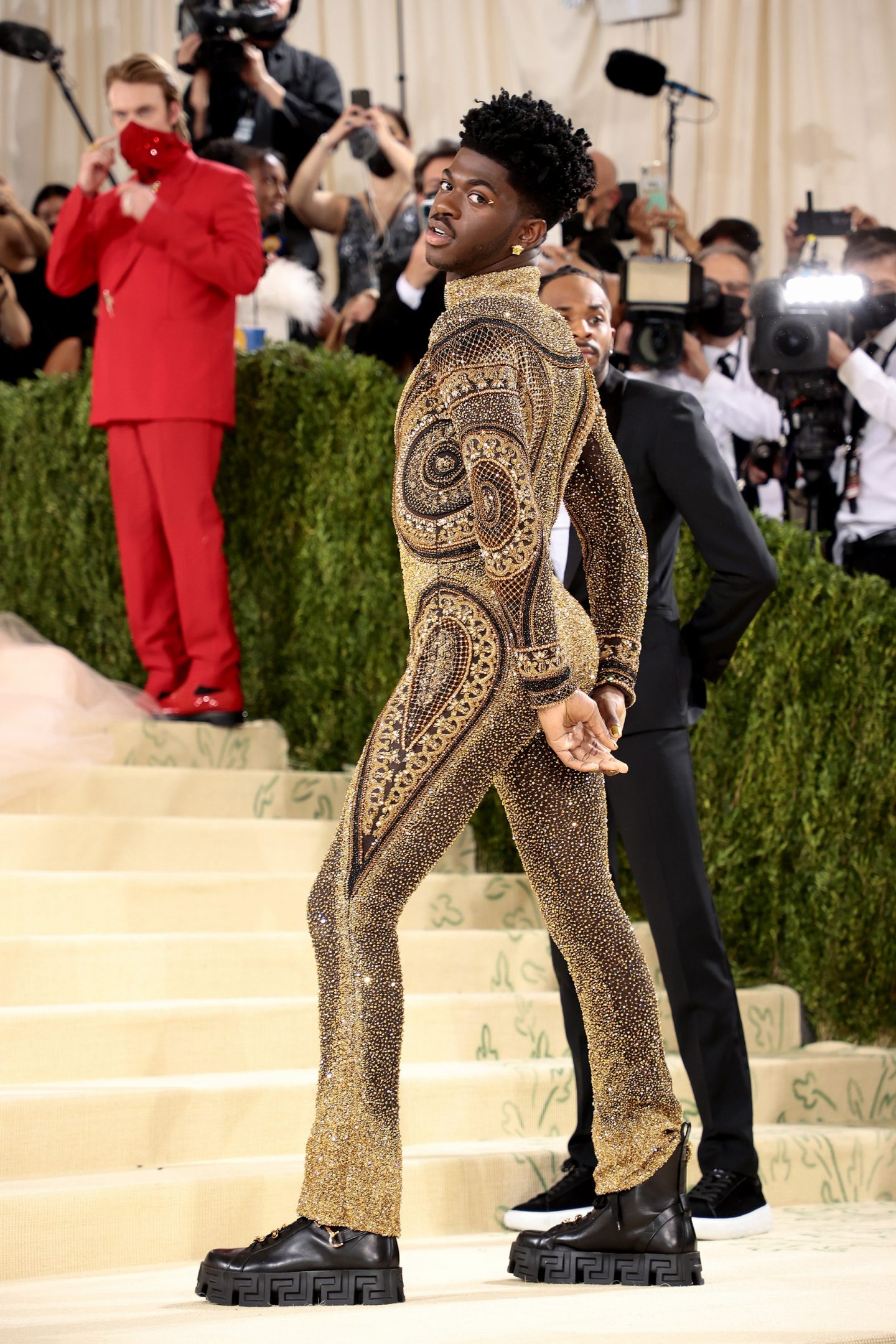 Lil Nas X in Versace shimmering bodysuit